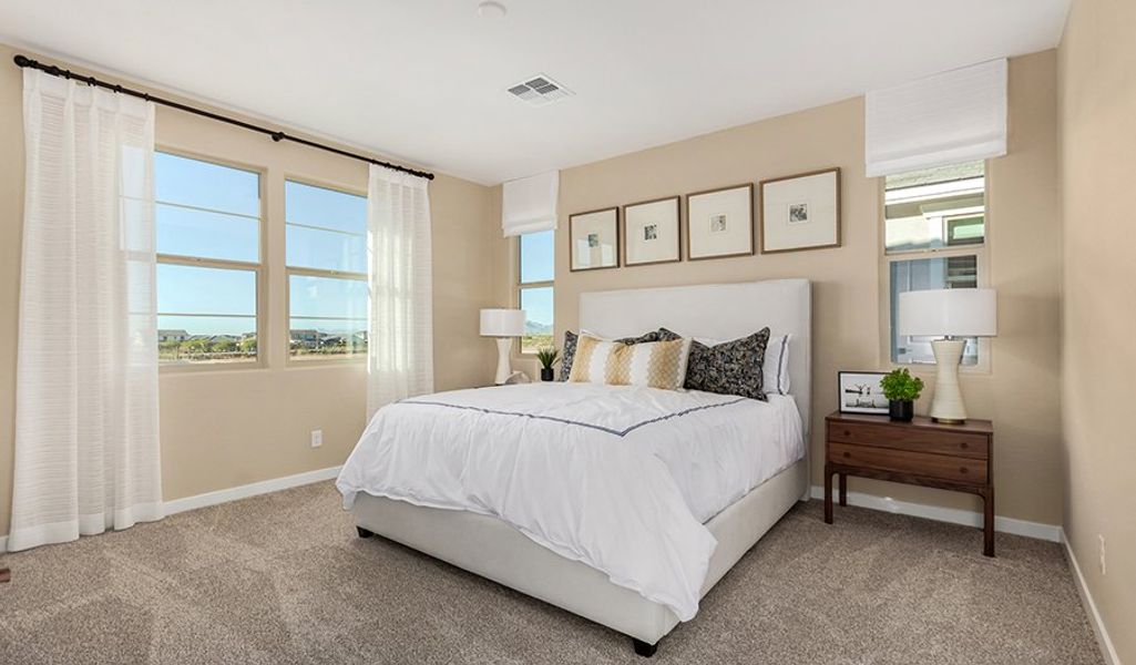 Furnished interior in a model home at Fusion at Blossom Rock in Apache Junction (Image 13).