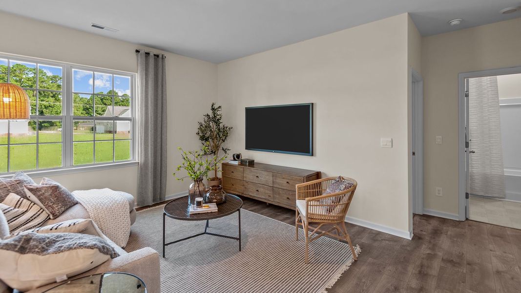 Furnished interior in a model home at The Preserve at Kinsley in Jamestown (Image 10).