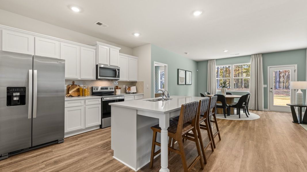 Furnished interior in a model home at WillowBrook in Winder (Image 7).