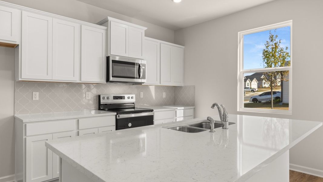 Furnished interior in a model home at Brooks Village in Dacula (Image 6).