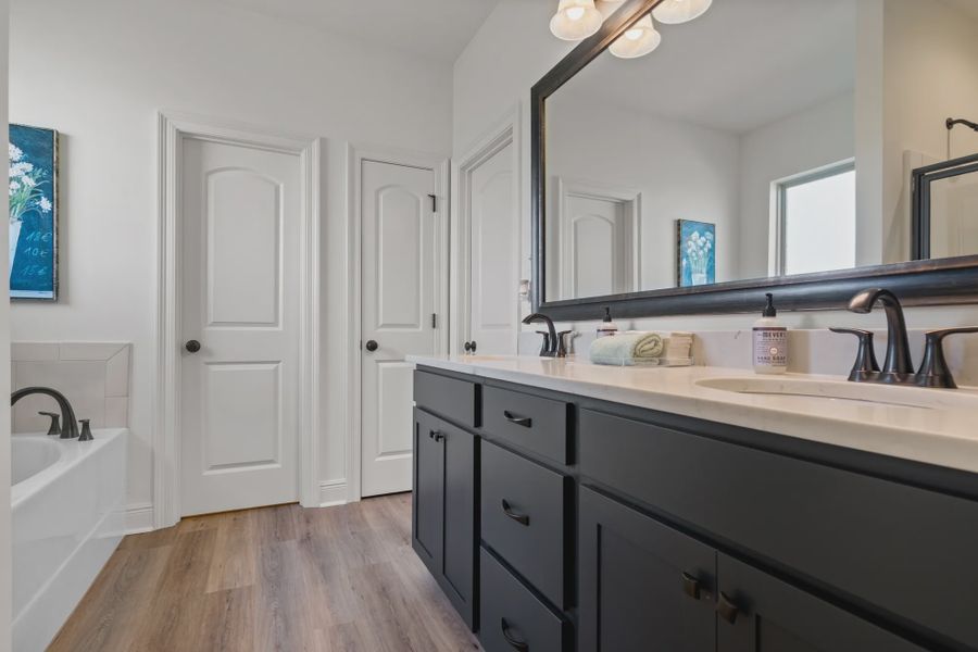 Furnished interior in a model home at Starburst at Hammock Bay in Freeport (Image 5).