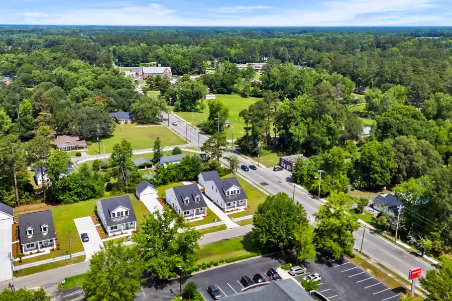 Aerial view of the Downtown Loris Homes community in Loris, SC, showing layout and nearby surroundings (Image 5). Aerial view of the Downtown Loris Homes community in Loris, SC, showing layout and nearby surroundings (Image 5).