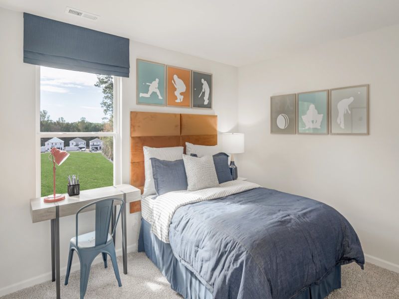 Three secondary upstairs bedrooms make room for the entire family.