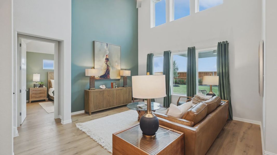 Experience high ceilings, expansive windows, and luxurious finishes in Wildflower Ranch, creating a serene haven. Experience high ceilings, expansive windows, and luxurious finishes in Wildflower Ranch, creating a serene haven.