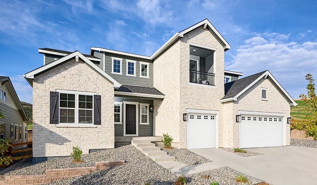 Front exterior of a home in the Chateau at the Meadows community, located in Castle Rock, CO (Image 1).