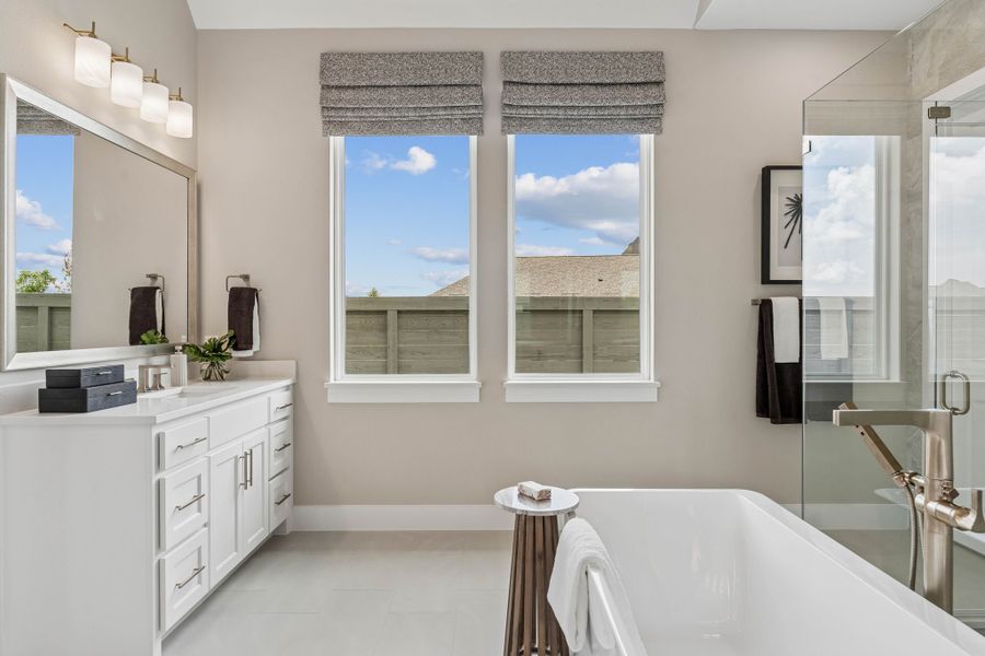 Bright Luxury Bath with Freestanding Tub and Natural Light Bright Luxury Bath with Freestanding Tub and Natural Light