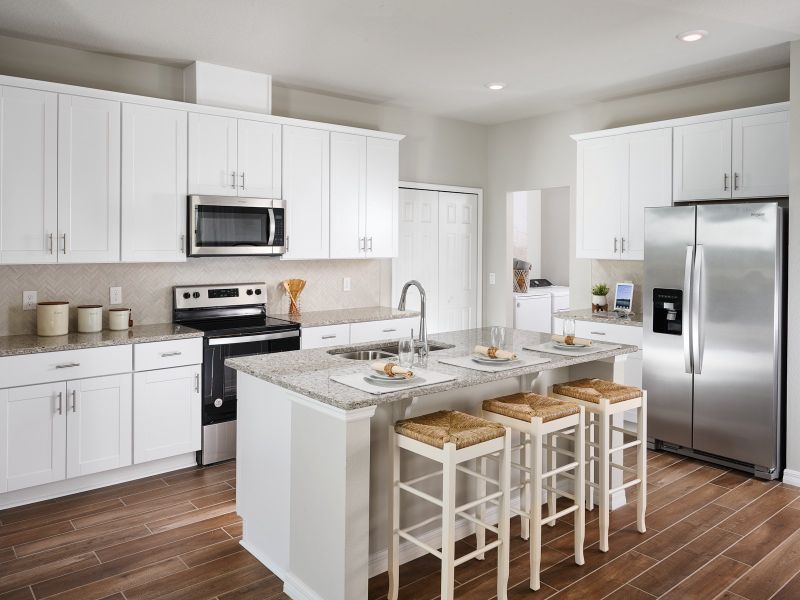 Furnished interior in a model home at Villages at Minneola Hills - Classic Series in Minneola (Image 6).