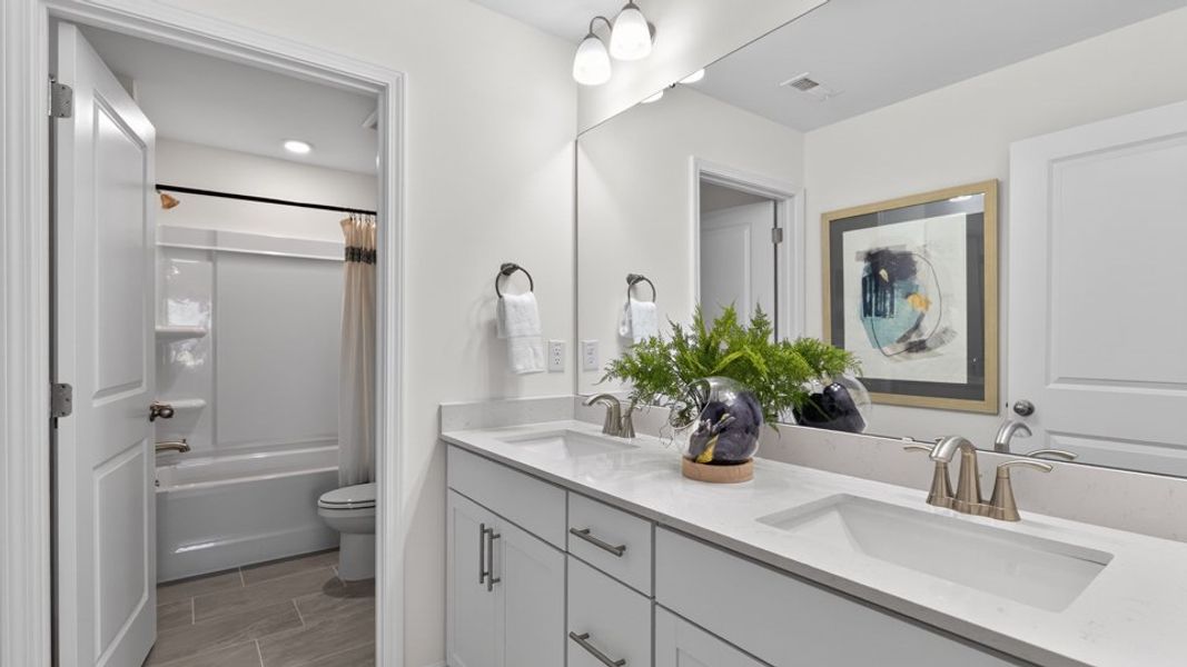 Furnished interior in a model home at The Grove at Winston Pointe in Clayton (Image 22).