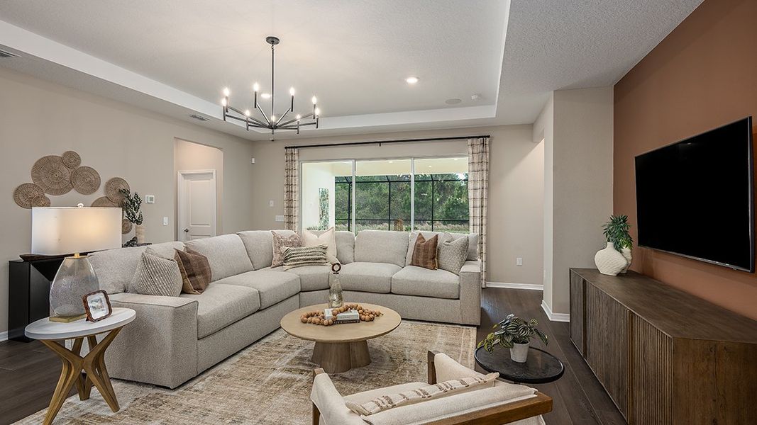 Furnished interior in a model home at Ardisia Park in New Smyrna Beach (Image 6).
