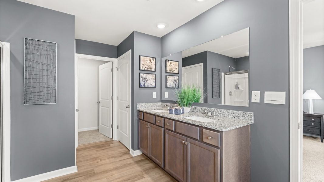 Furnished interior in a model home at Carlton in Douglasville (Image 13).