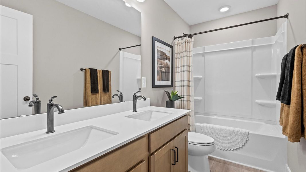 Furnished interior in a model home at Benjamin's Grove in Woodruff (Image 26). Furnished interior in a model home at Benjamin's Grove in Woodruff (Image 26).