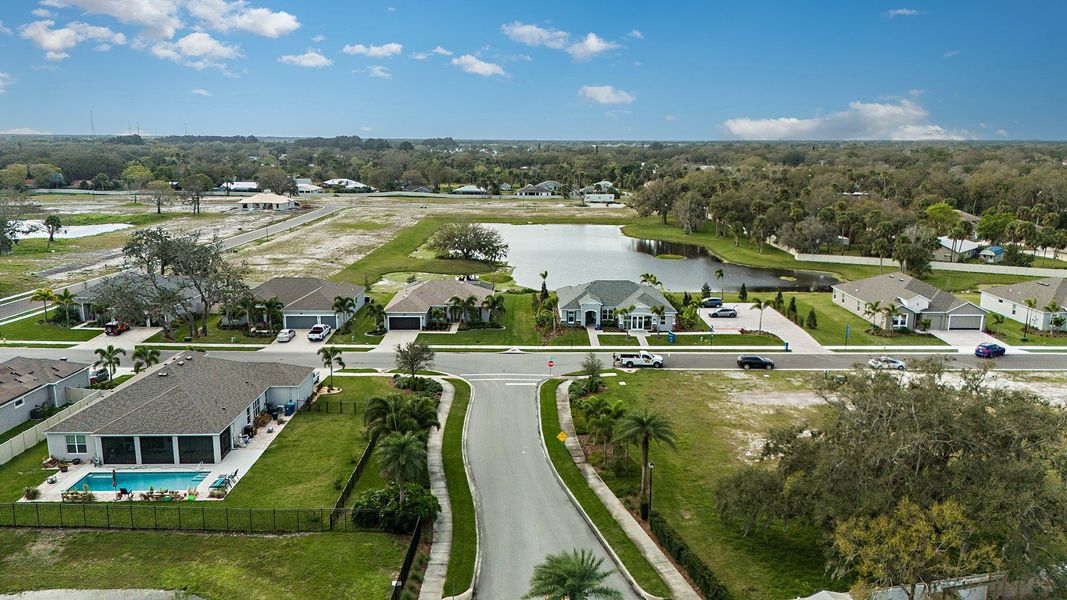 Aerial view of the Country Club Estates community in Palm Bay, FL, showing layout and nearby surroundings (Image 10).