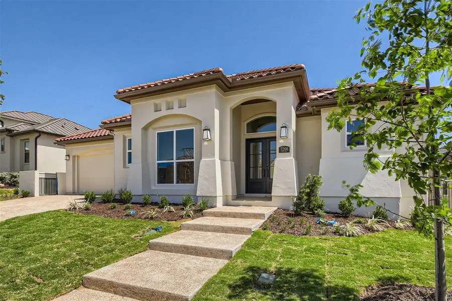 Front exterior of a home in the The Bluff At The Dominion community, located in Shavano Park, TX (Image 6).