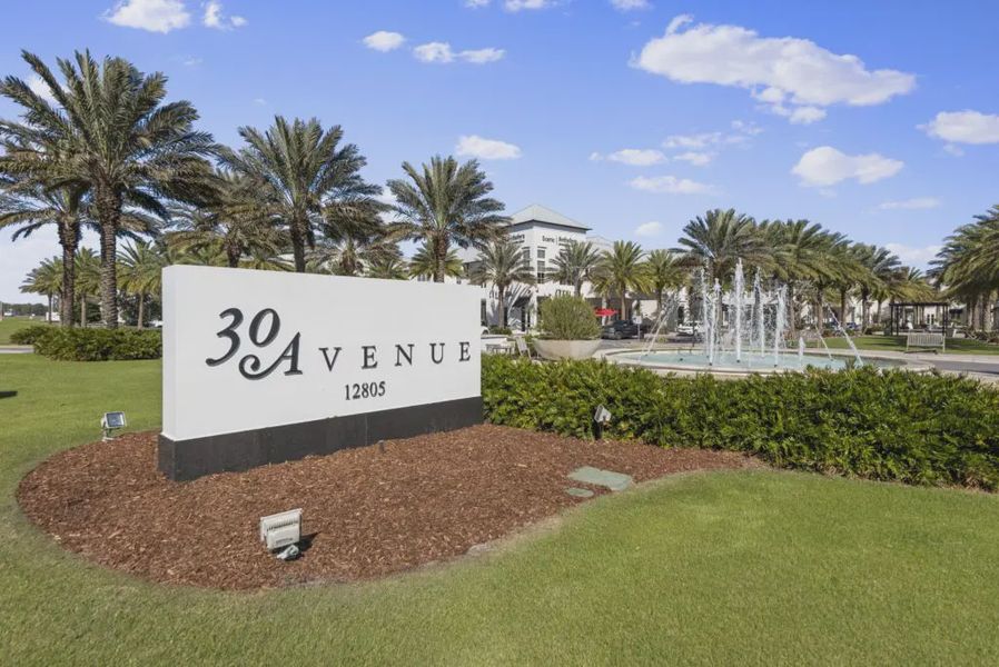 Entrance to the Nautilus Pointe community in Inlet Beach, FL, featuring signage and landscaping (Image 2).