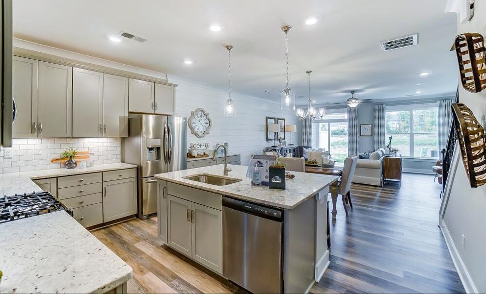 Furnished interior in a model home at CraigStone in Woodruff (Image 19).