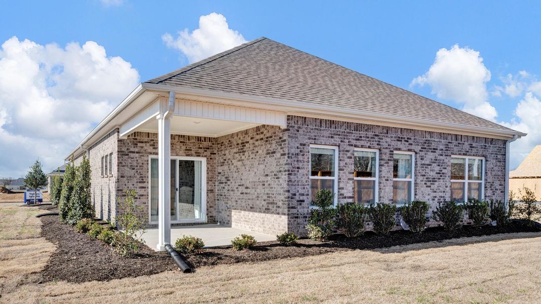 Front exterior of a home in the The Orchard community, located in Millington, TN (Image 8).