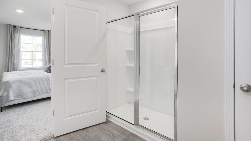 Furnished interior in a model home at Faircrest in Greensboro (Image 18).