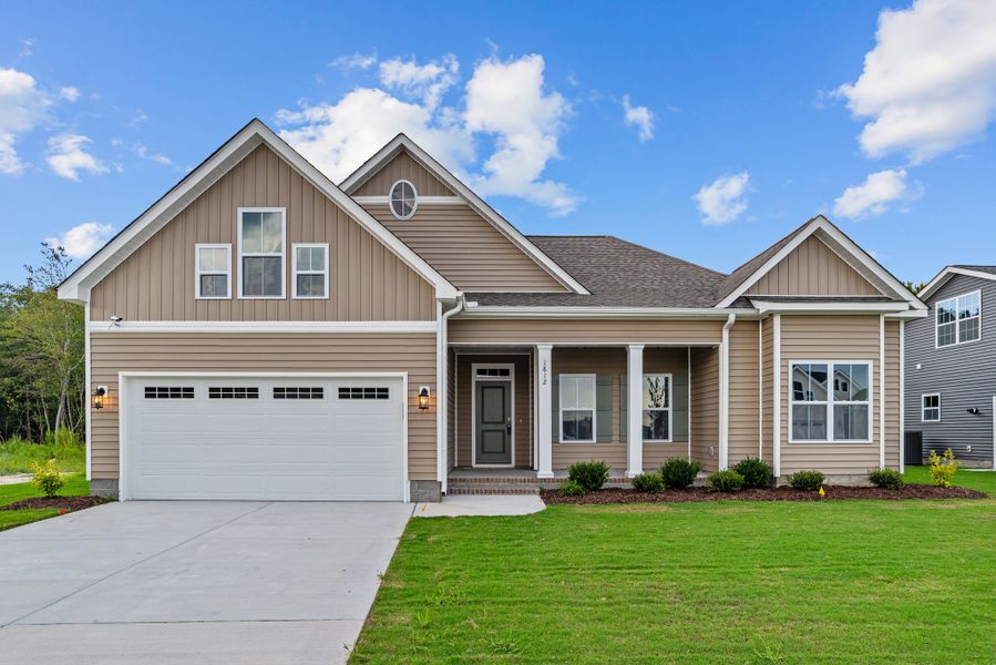 Front exterior of a home in the The Villas at Langston Farms community, located in Winterville, NC (Image 14).