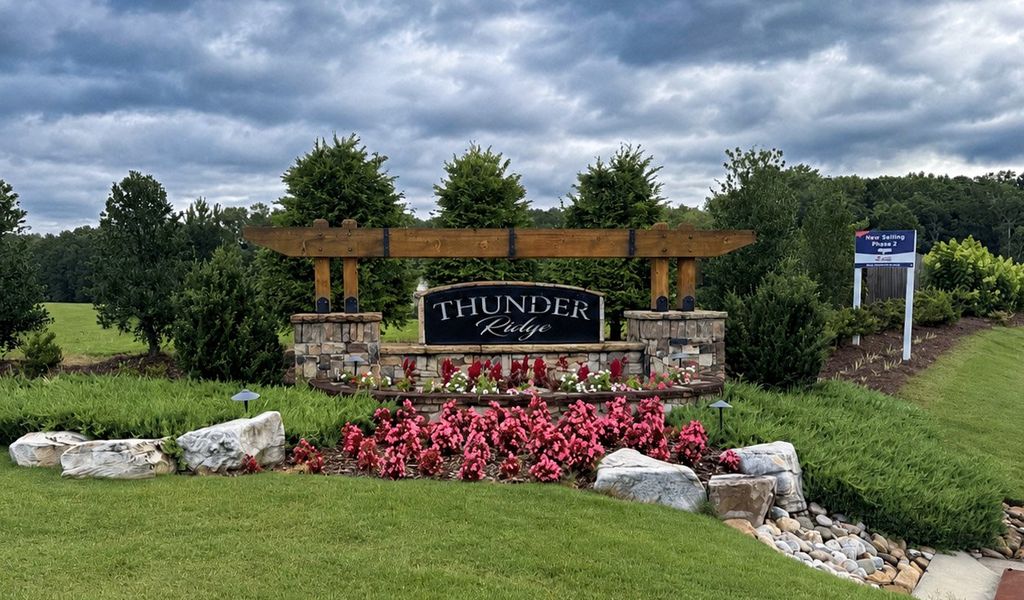 Entrance to the Thunder Ridge community in Dawsonville, GA, featuring signage and landscaping (Image 1). Entrance to the Thunder Ridge community in Dawsonville, GA, featuring signage and landscaping (Image 1).
