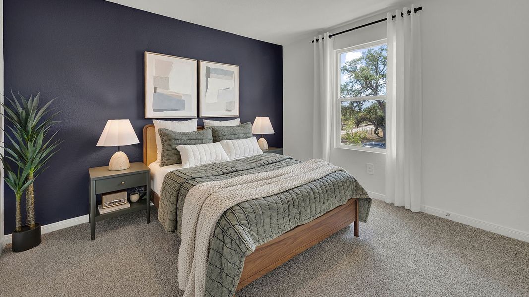 Furnished interior in a model home at Paramount in Kyle (Image 27).