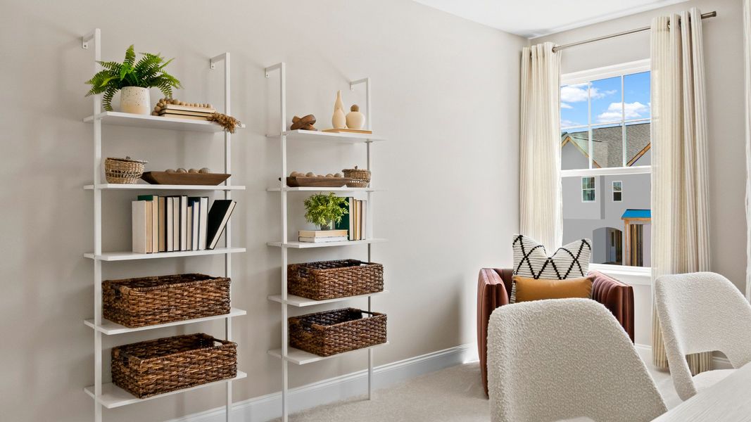 Furnished interior in a model home at Sidney Creek Townhomes in Zebulon (Image 36).