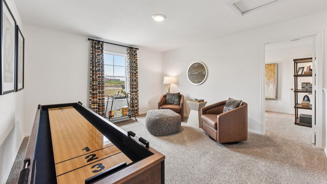 Furnished interior in a model home at Palomino in Manor (Image 35).