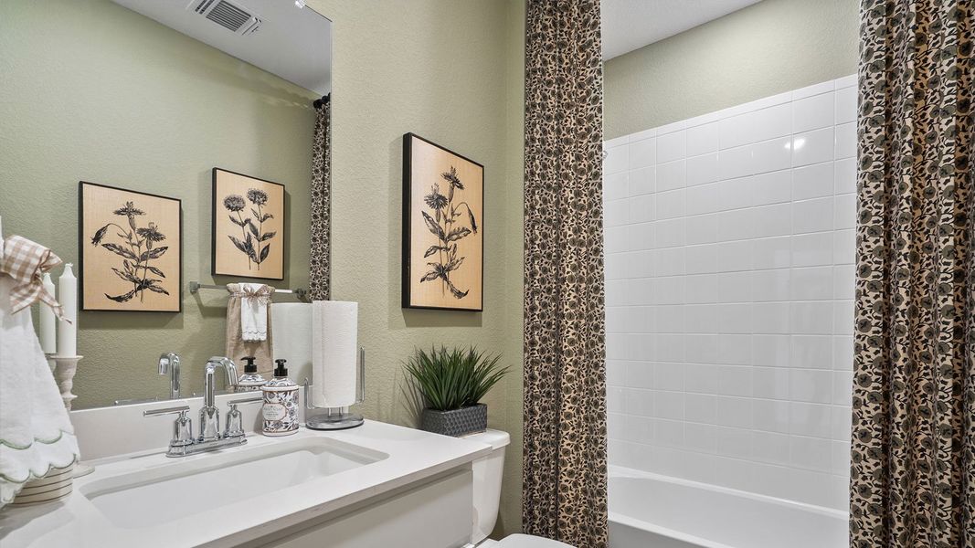 Furnished interior in a model home at Rosenbusch Ranch in Leander (Image 85).