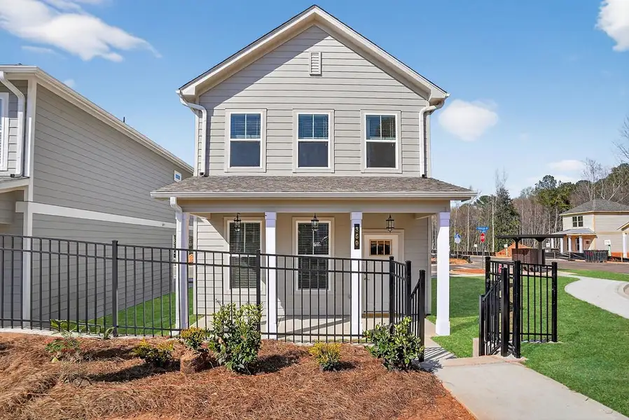 Front exterior of a home in the The Cottages at East Lanier community, located in Fayetteville, GA (Image 2). Front exterior of a home in the The Cottages at East Lanier community, located in Fayetteville, GA (Image 2).