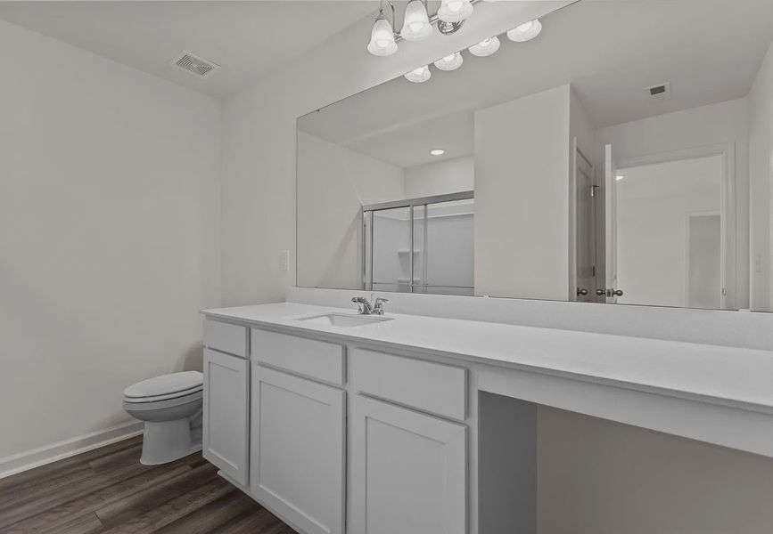 Furnished interior in a model home at The Summit at Carters Station in Columbia (Image 17).