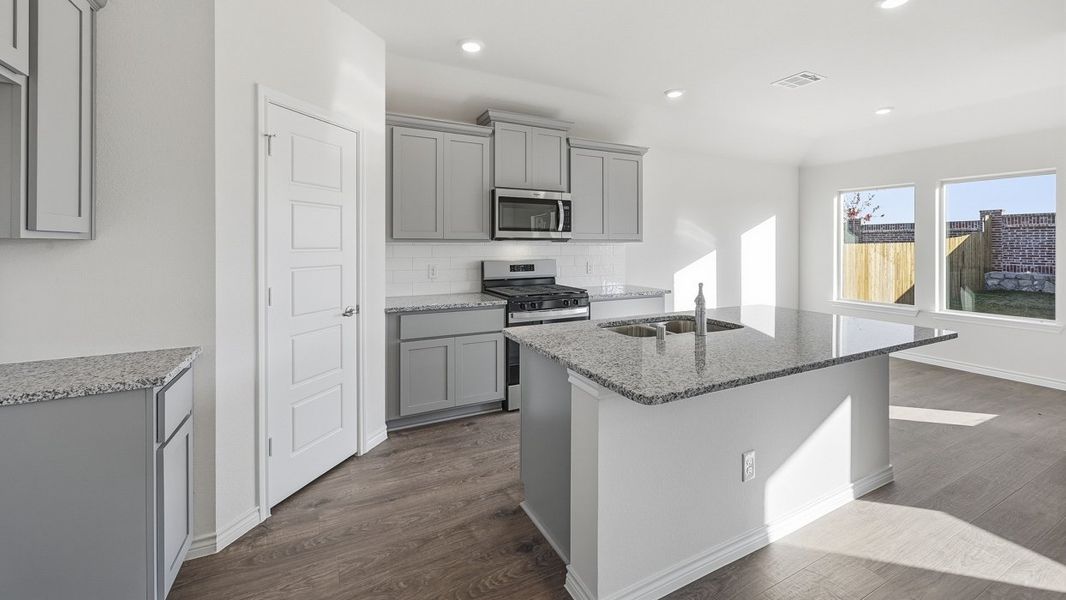 Furnished interior in a model home at Windchime in Celina (Image 6).