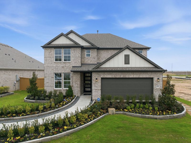 A house with a large front yard. A house with a large front yard.