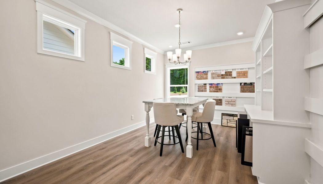 Furnished interior in a model home at Fowler Farms in Auburn (Image 137).