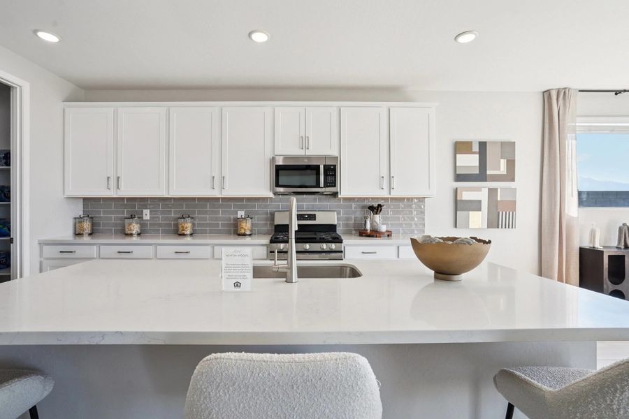 Furnished interior in a model home at Estates at Estrella Crossing in Phoenix (Image 7).