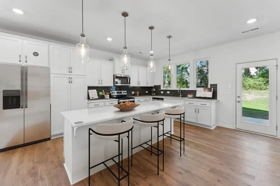 Furnished interior in a model home at Westbrook Falls in Colfax (Image 4).