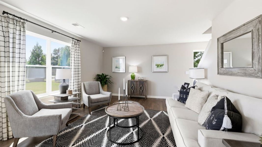 Furnished interior in a model home at Treemont Commons in Wellford (Image 14).