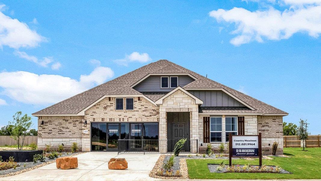 Front exterior of a home in the Country Meadows community, located in Thorndale, TX (Image 1).