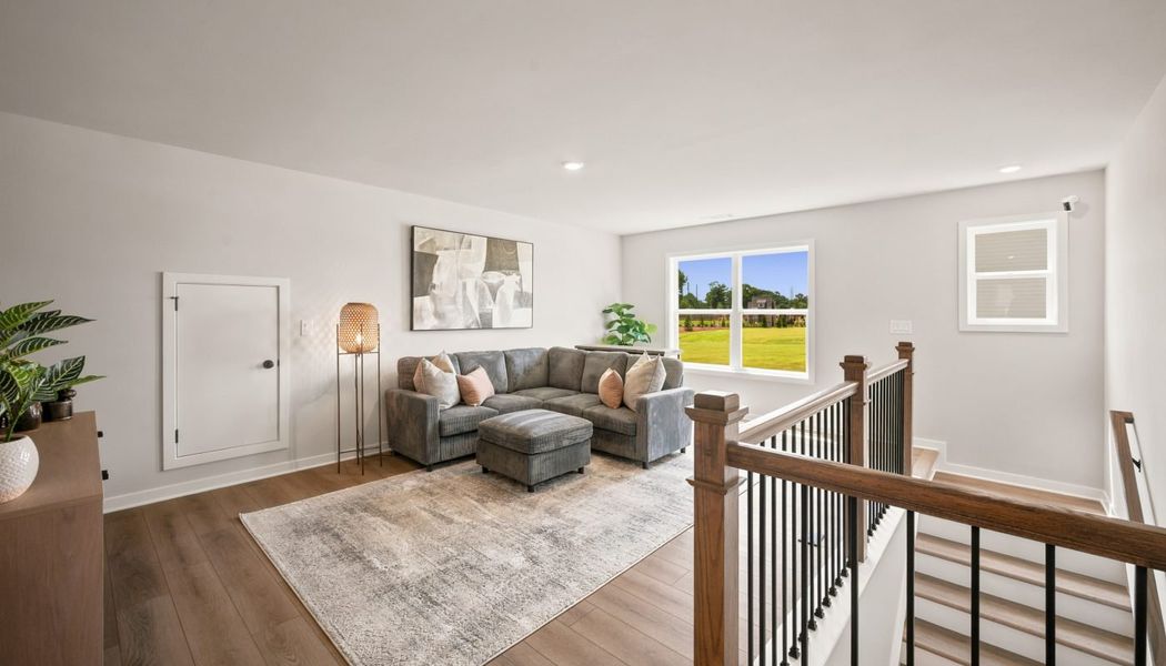 Furnished interior in a model home at Fowler Farms in Auburn (Image 87).