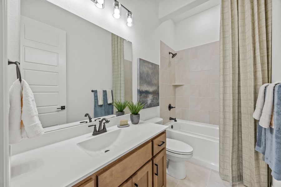 Furnished interior in a model home at Paloma Ranch in New Fairview (Image 31).