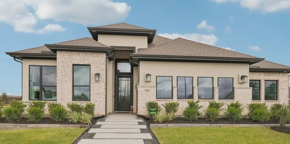 Front exterior of a home in the Wood Leaf Reserve community, located in Tomball, TX (Image 1). Front exterior of a home in the Wood Leaf Reserve community, located in Tomball, TX (Image 1).