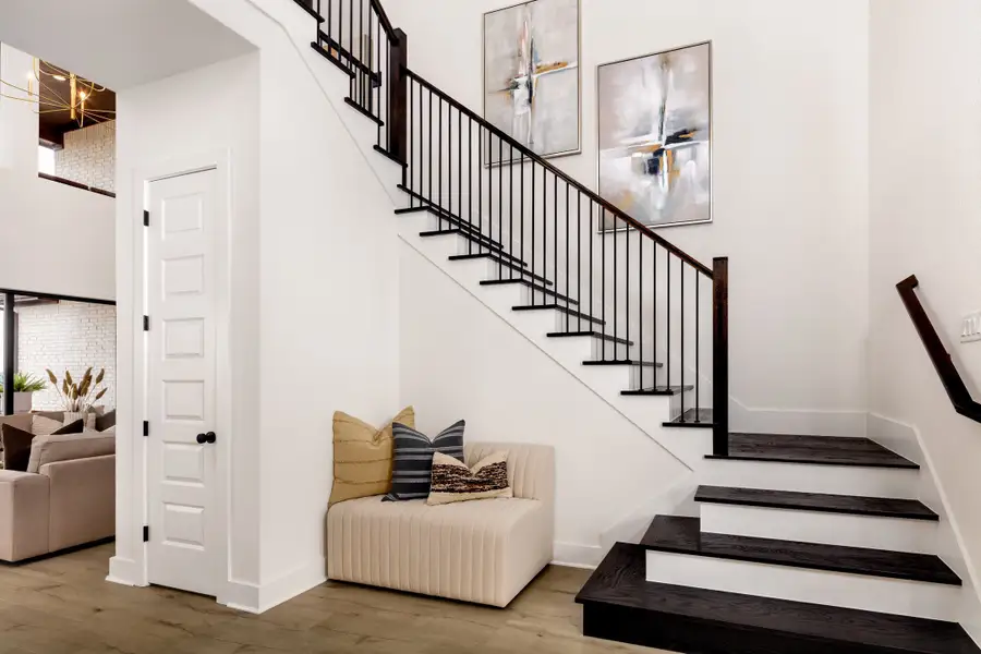 Furnished interior in a model home at 6 Creeks in Kyle (Image 25).