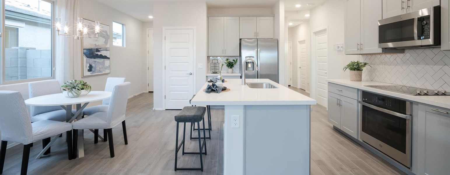 Furnished interior in a model home at Beacon Hill at Marley Park in Surprise (Image 7).