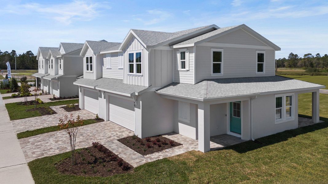 Front exterior of a home in the Cyrene at Harmony community, located in St. Cloud, FL (Image 9). Front exterior of a home in the Cyrene at Harmony community, located in St. Cloud, FL (Image 9).