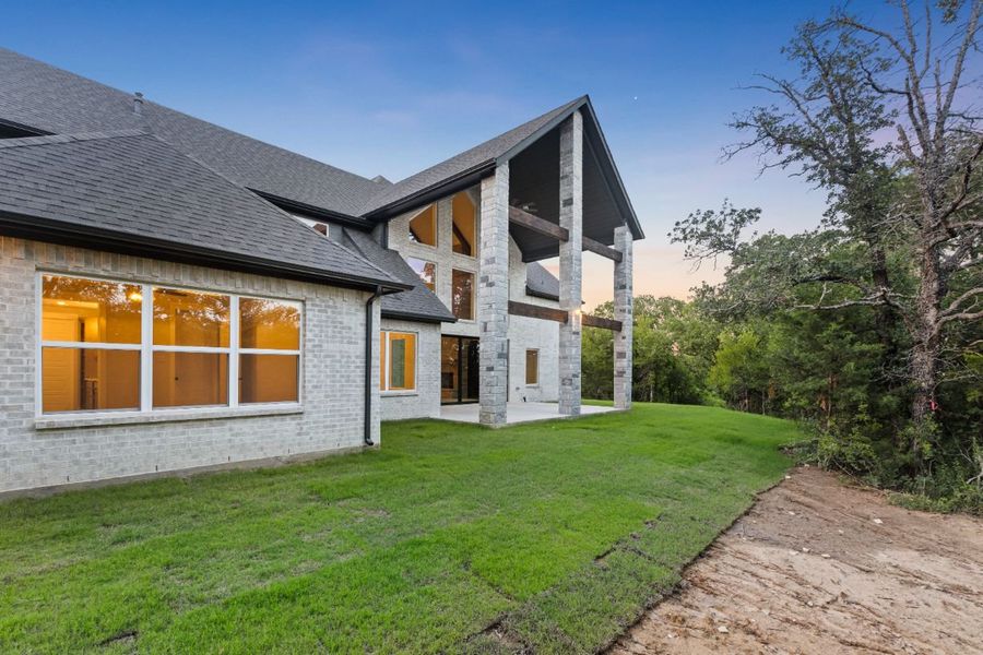 Front exterior of a home in the Lola Creek Ranch community, located in Boyd, TX (Image 14).