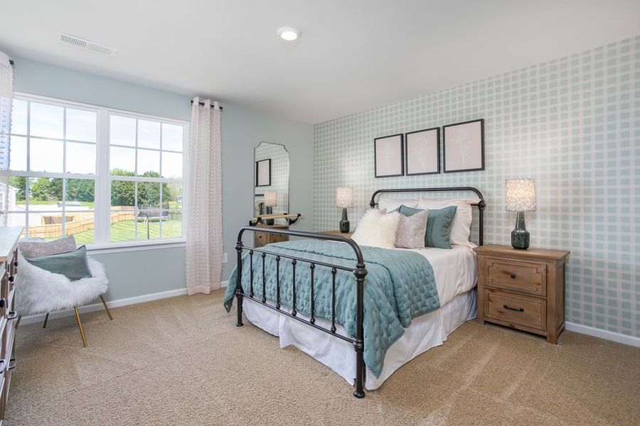 Furnished interior in a model home at Steeplegate Village in Trinity (Image 17).