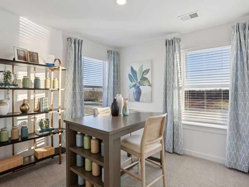 Furnished interior in a model home at Greystone - Highland Townhomes in Smyrna (Image 9).