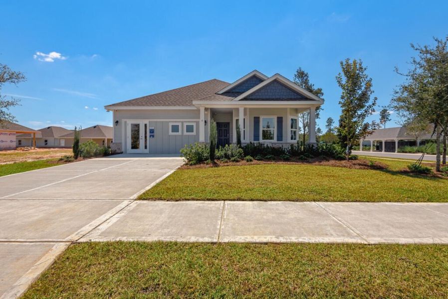 Front exterior of a home in the Natureview community, located in Freeport, FL (Image 4). Front exterior of a home in the Natureview community, located in Freeport, FL (Image 4).