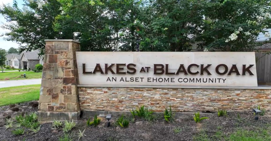 Entrance to the Lakes at Black Oak community in Magnolia, TX, featuring signage and landscaping (Image 2).