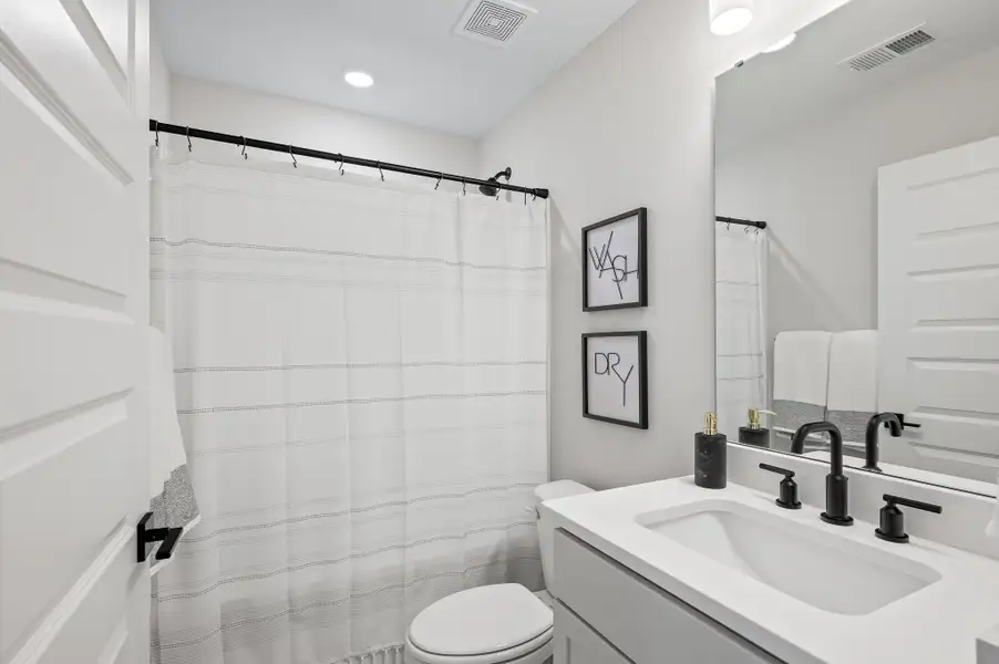 Furnished interior in a model home at Windward Townes in Goose Creek (Image 17).