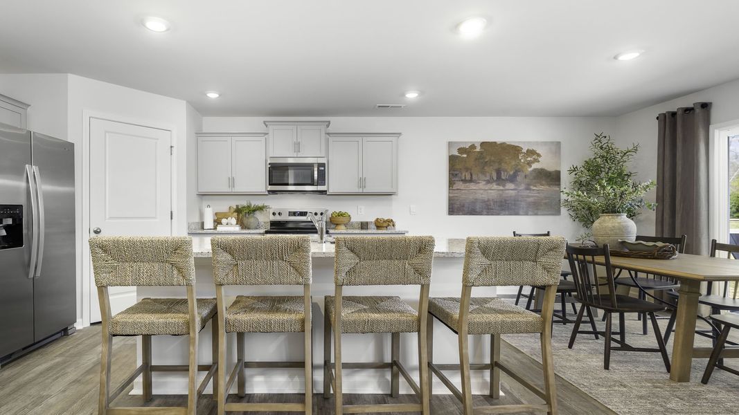 Furnished interior in a model home at Greystone North in Stoneville (Image 12). Furnished interior in a model home at Greystone North in Stoneville (Image 12).