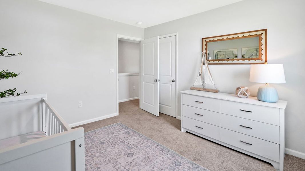 Furnished interior in a model home at Bella Point in Bolivia (Image 25).